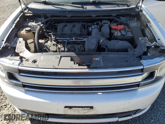 2013 Ford Flex Limited z VIN 2FMHK6D86DBD05146, wystawiony jako Copart lot #52720325 z przebiegiem 174 536 mil mil oraz Szkoda całkowita • Salvage title. Historia ofert i sprzedaży dostępna na DreamBid. Obrazek 14.