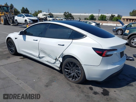 2025 Tesla Model 3 Long Range with VIN 5YJ3E1EB3SF914858, listed as a IAAI auction lot 42719707 with 5,849 mi miles and . Bid and sale history available at DreamBid. Image 3.