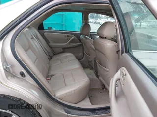 2001 Toyota Camry CE with VIN 4T1BG22K91U016864, listed as a IAAI auction lot 42068573 with 251,307 mi miles. Bid and sale history available at carsss.com. Image 8.