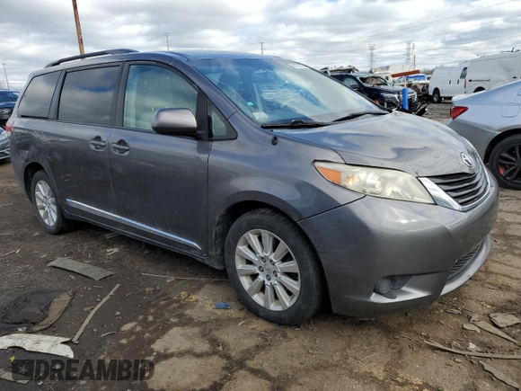 2014 Toyota Sienna LE with VIN 5TDJK3DCXES078004, listed as a Copart auction lot 48161085 with 220,254 mi miles and Clean Title. Bid and sale history available at DreamBid. Image 4.