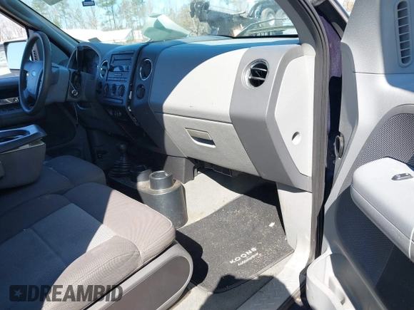 2006 Ford F-150 STX with VIN 1FTRX14W36NB57928, listed as a IAAI auction lot 41704722 with 145,855 mi miles. Bid and sale history available at carsss.com. Image 5.