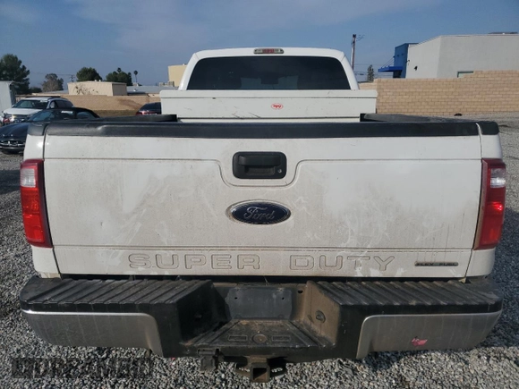 2015 Ford F-250 XLT with VIN 1FT7X2A65FEA41700, listed as a Copart auction lot 42645615 with 172,430 mi miles and Salvage title. Bid and sale history available at DreamBid. Image 6.
