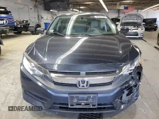 2018 Honda Civic EX с VIN 19XFC2F77JE040070, выставлен на аукционе Copart как лот 56895195 с пробегом 39 746 миль миль и Списание • Salvage title. История ставок и продаж доступна на DreamBid. Изображение 5.