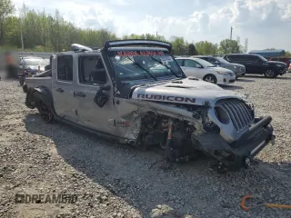 2020 Jeep Gladiator Rubicon z VIN 1C6JJTBG9LL135016, wystawiony jako Copart lot #52374035 z przebiegiem Nie podano mil oraz Szkoda całkowita • Salvage title. Historia ofert i sprzedaży dostępna na DreamBid. Obrazek 4.