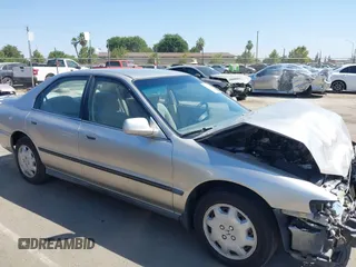 1997 Honda Accord LX with VIN 1HGCD5635VA207079, listed as a IAAI auction lot 42599112 with 267,085 mi miles and . Bid and sale history available at DreamBid. Image 14.