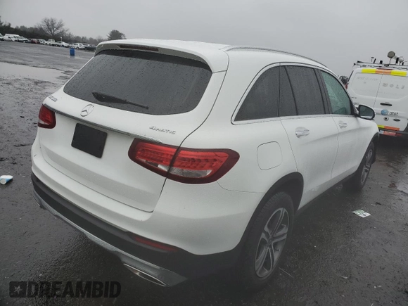 2019 Mercedes-Benz GLC with VIN WDC0G4KB4KV131837, listed as a Copart auction lot 70310052 with 64,571 mi miles. Bid and sale history available at carsss.com. Image 3.