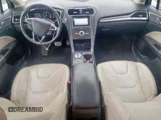 2017 Ford Fusion Hybrid Titanium with VIN 3FA6P0RU7HR388521, listed as a Copart auction lot 57318895 with 117,720 mi miles and Salvage title. Bid and sale history available at DreamBid. Image 8.