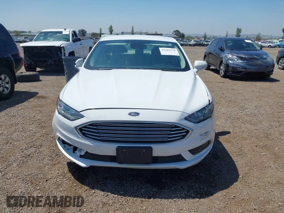 2018 Ford Fusion SE z VIN 3FA6P0LU2JR261268, wystawiony jako IAAI lot #42301578 z przebiegiem 63 357 mil mil oraz . Historia ofert i sprzedaży dostępna na DreamBid. Obrazek 12.