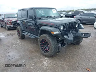 2022 Jeep Wrangler Unlimited Sport S z VIN 1C4HJXDG0NW133801, wystawiony jako IAAI lot #41908846 z przebiegiem 44 743 mil mil oraz . Historia ofert i sprzedaży dostępna na DreamBid. Obrazek 1.