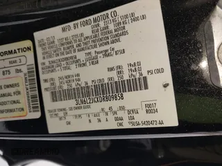 2013 Lincoln MKZ with VIN 3LN6L2JKXDR809858, listed as a IAAI auction lot 41517344 with 204,470 mi miles. Bid and sale history available at carsss.com. Image 9.
