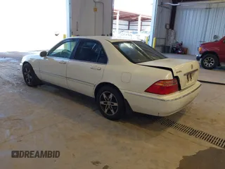 1999 Acura RL with VIN JH4KA9661XC007276, listed as a IAAI auction lot 41686607 with 249,992 mi miles. Bid and sale history available at carsss.com. Image 3.