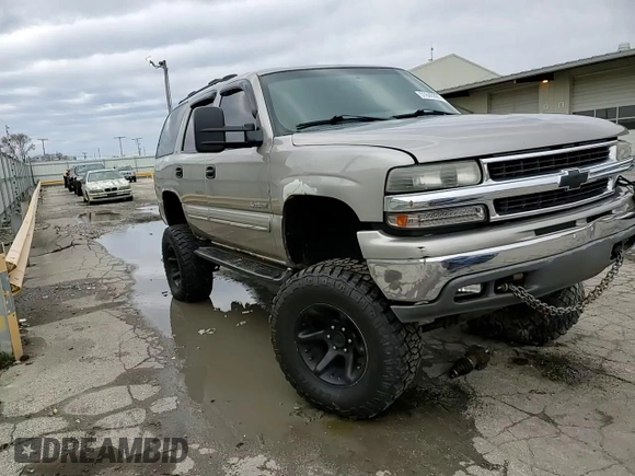 2000 Chevrolet Tahoe LS with VIN 1GNEK13T7YJ148901, listed as a Copart auction lot 51840995 with 195,543 mi miles and Salvage title. Bid and sale history available at DreamBid. Image 11.