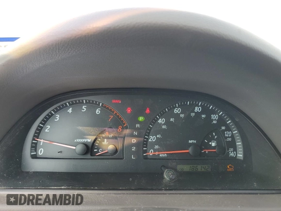 2002 Toyota Camry XLE z VIN 4T1BF32K12U519069, wystawiony jako Copart lot #55501405 z przebiegiem 186 142 mil mil oraz Szkoda całkowita • Salvage title. Historia ofert i sprzedaży dostępna na DreamBid. Obrazek 9.