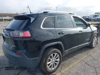 2019 Jeep Cherokee Latitude with VIN 1C4PJLCB8KD215423, listed as a IAAI auction lot 41911882 with 76,965 mi miles. Bid and sale history available at carsss.com. Image 4.