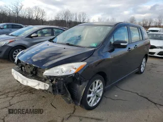 2014 Mazda 5 Grand Touring with VIN JM1CW2DL3E0174132, listed as a Copart auction lot 87905175 with 127,786 mi miles and Salvage Title. Bid and sale history available at DreamBid. Image 1.