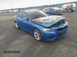 2013 BMW 3 Series 335i xDrive with VIN WBA3B9C56DJ899480, listed as a IAAI auction lot 41512036 with 83,760 mi miles. Bid and sale history available at carsss.com. Image 1.