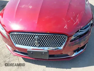 2019 Lincoln MKZ Hybrid Reserve II with VIN 3LN6L5MU7KR617325, listed as a IAAI auction lot 42584481 with 76,118 mi miles and . Bid and sale history available at DreamBid. Image 17.