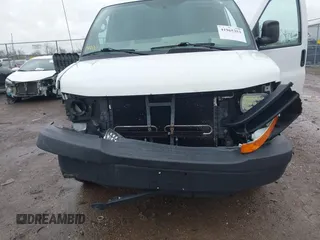2014 Chevrolet Express Cargo Van with VIN 1GCWGGCA0E1155572, listed as a IAAI auction lot 41965353 with 324,538 mi miles. Bid and sale history available at carsss.com. Image 6.