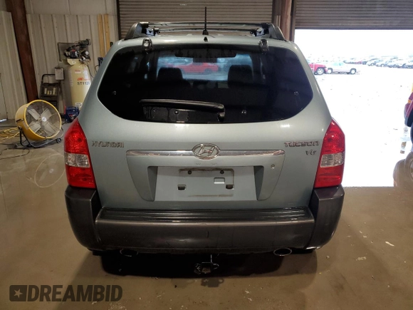 2007 Hyundai Tucson SE with VIN KM8JN12D27U491472, listed as a Copart auction lot 51324115 with 106,894 mi miles and Salvage Title. Bid and sale history available at carsss.com. Image 6.