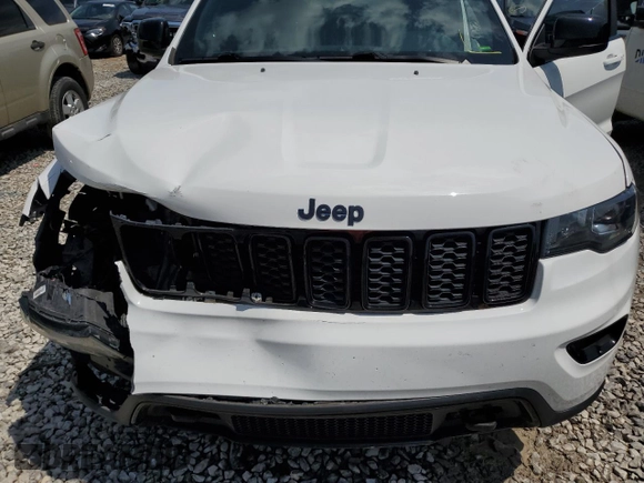 2019 Jeep Grand Cherokee Laredo E with VIN 1C4RJFAG8KC637464, listed as a Copart auction lot 60451115 with 102,105 mi miles and Salvage title. Bid and sale history available at DreamBid. Image 12.