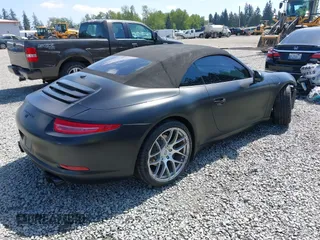 2014 Porsche 911 Carrera z VIN WP0CA2A94ES140857, wystawiony jako IAAI lot #42159010 z przebiegiem 46 230 mil mil oraz . Historia ofert i sprzedaży dostępna na DreamBid. Obrazek 4.