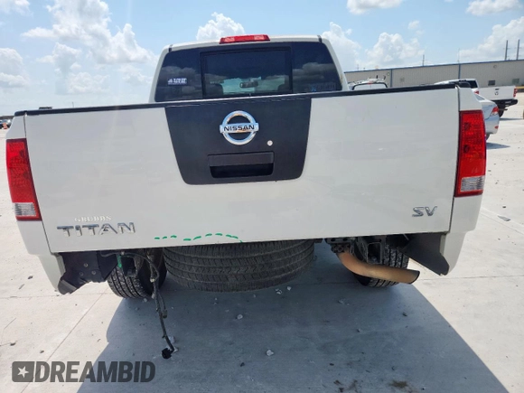 2011 Nissan Titan SV with VIN 1N6AA0ED7BN303938, listed as a Copart auction lot 61661175 with 138,098 mi miles and Salvage title. Bid and sale history available at DreamBid. Image 6.