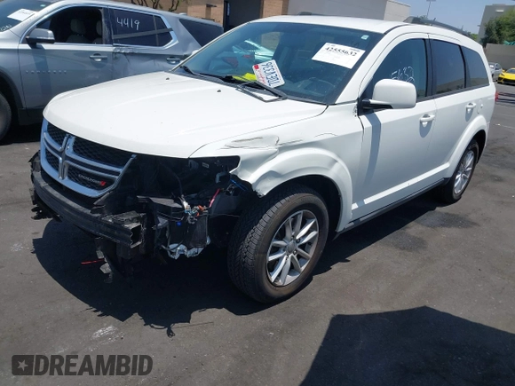 2013 Dodge Journey SXT with VIN 3C4PDCBG4DT696966, listed as a IAAI auction lot 42555632 with 144,927 mi miles and . Bid and sale history available at DreamBid. Image 6.