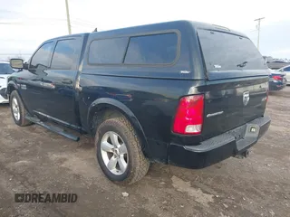 2015 Ram 1500 Outdoorsman z VIN 1C6RR7LT8FS653031, wystawiony jako IAAI lot #41581094 z przebiegiem 129 178 mil mil oraz . Historia ofert i sprzedaży dostępna na DreamBid. Obrazek 3.
