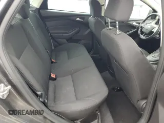 2016 Ford Focus SE z VIN 1FADP3F23GL405565, wystawiony jako Copart lot #60173935 z przebiegiem 82 167 mil mil oraz Szkoda całkowita • Salvage title. Historia ofert i sprzedaży dostępna na DreamBid. Obrazek 10.