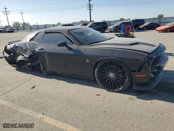 2016 Dodge Challenger R/T Scat Pack with VIN 2C3CDZFJ3GH202069, listed as a Copart auction lot 73378054 with 104,078 mi miles and Salvage Title. Bid and sale history available at carsss.com. Image 4.