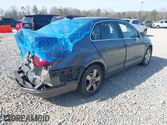 2010 Volkswagen Jetta SE z VIN 3VWRX7AJ0AM055031, wystawiony jako IAAI lot #41748603 z przebiegiem 175 016 mil mil oraz . Historia ofert i sprzedaży dostępna na DreamBid. Obrazek 4.