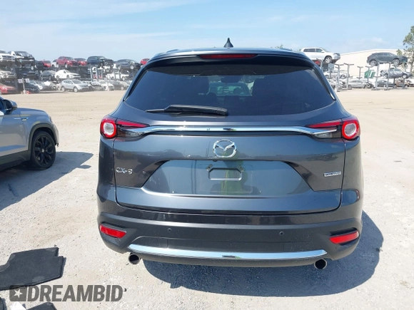 2020 Mazda CX-9 Grand Touring z VIN JM3TCADY8L0417775, wystawiony jako IAAI lot #42306864 z przebiegiem 35 287 mil mil oraz . Historia ofert i sprzedaży dostępna na DreamBid. Obrazek 17.