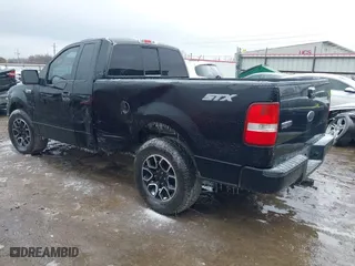 2005 Ford F-150 XL with VIN 1FTRF12W15KC00040, listed as a IAAI auction lot 41532710 with 172,371 mi miles. Bid and sale history available at carsss.com. Image 3.