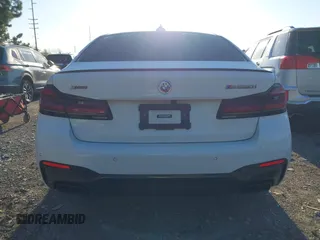 2023 BMW 5 Series M550i xDrive with VIN WBA13BK04PCL88909, listed as a IAAI auction lot 42045994 with 27,729 mi miles and . Bid and sale history available at DreamBid. Image 17.