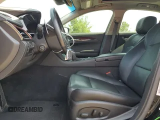 2015 Cadillac CTS Luxury RWD with VIN 1G6AR5SX2F0115311, listed as a Copart auction lot 58944915 with 34,764 mi miles and Salvage title. Bid and sale history available at DreamBid. Image 7.