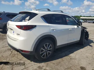 2018 Mazda CX-5 Grand Touring с VIN JM3KFADM3J1351532, выставлен на аукционе Copart как лот 55567405 с пробегом 99 134 миль миль и Списание • Salvage title. История ставок и продаж доступна на DreamBid. Изображение 3.