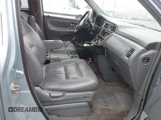 2003 Honda Odyssey EX-L with VIN 5FNRL18943B138444, listed as a IAAI auction lot 41498605 with 153,947 mi miles and . Bid and sale history available at DreamBid. Image 5.