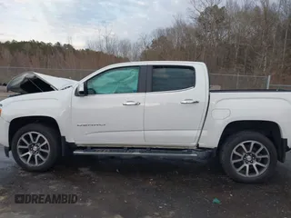 2021 GMC Canyon 4WD Denali with VIN 1GTG6EEN6M1240894, listed as a IAAI auction lot 41387786 with 73,323 mi miles. Bid and sale history available at carsss.com. Image 14.