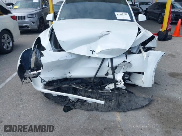 2023 Tesla Model Y Long Range with VIN 7SAYGDEE9PA026005, listed as a IAAI auction lot 41895223 with 43,813 mi miles and . Bid and sale history available at DreamBid. Image 6.