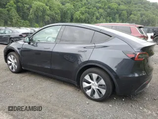 2024 Tesla Model Y с VIN 7SAYGDED2RF040079, выставлен на аукционе Copart как лот 61415675 с пробегом 2 549 миль миль и На запчасти • Non repairable. История ставок и продаж доступна на DreamBid. Изображение 2.