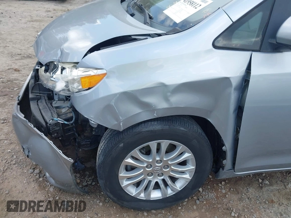2015 Toyota Sienna XLE with VIN 5TDYK3DC7FS659864, listed as a IAAI auction lot 41958112 with 121,257 mi miles and . Bid and sale history available at DreamBid. Image 17.