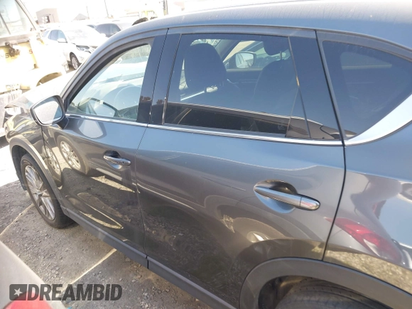 2020 Mazda CX-5 Grand Touring with VIN JM3KFADM7L0766278, listed as a IAAI auction lot 41297902 with 1 mi miles. Bid and sale history available at carsss.com. Image 15.