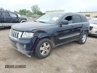 2011 Jeep Grand Cherokee Laredo with VIN 1J4RR4GG9BC608778, listed as a IAAI auction lot 42314313 with 151,780 mi miles and . Bid and sale history available at DreamBid. Image 2.
