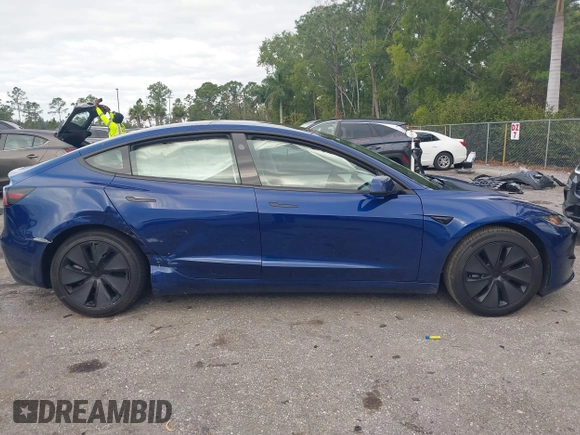 2025 Tesla Model 3 Long Range with VIN 5YJ3E1EA2SF919461, listed as a IAAI auction lot 41672494 with 777 mi miles and . Bid and sale history available at DreamBid. Image 13.