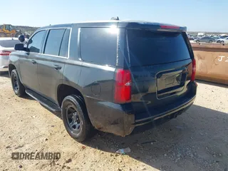 2015 Chevrolet Tahoe Commercial z VIN 1GNLC2EC7FR575386, wystawiony jako IAAI lot #41836137 z przebiegiem 143 231 mil mil oraz . Historia ofert i sprzedaży dostępna na DreamBid. Obrazek 3.