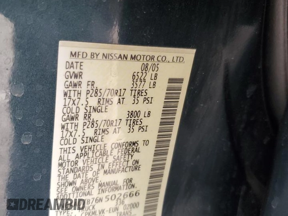 2006 Nissan Titan SE with VIN 1N6AA07B76N502666, listed as a Copart auction lot 56917515 with 118,877 mi miles and Salvage title. Bid and sale history available at DreamBid. Image 12.