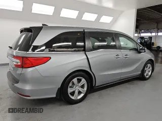 2018 Honda Odyssey EX-L с VIN 5FNRL6H78JB079617, выставлен на аукционе Copart как лот 55087295 с пробегом 185 534 миль миль и Чистый • Clean title. История ставок и продаж доступна на DreamBid. Изображение 3.