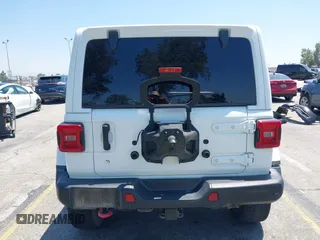 2018 Jeep Wrangler Unlimited Rubicon with VIN 1C4HJXFN8JW215023, listed as a IAAI auction lot 42227099 with 62,195 mi miles and . Bid and sale history available at DreamBid. Image 16.