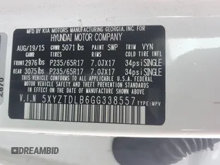 2016 Hyundai Santa Fe z VIN 5XYZTDLB6GG338557, wystawiony jako Copart lot #57899185 z przebiegiem 91 702 mil mil oraz Czysty tytuł • Clean title. Historia ofert i sprzedaży dostępna na DreamBid. Obrazek 12.