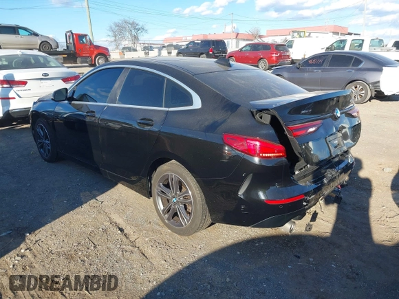 2021 BMW 2 Series 228i xDrive with VIN WBA73AK03M7H66827, listed as a IAAI auction lot 41682959 with 57,875 mi miles and . Bid and sale history available at DreamBid. Image 3.
